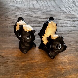 Charming Black and Cream Skunk Figurines
Made in Japan